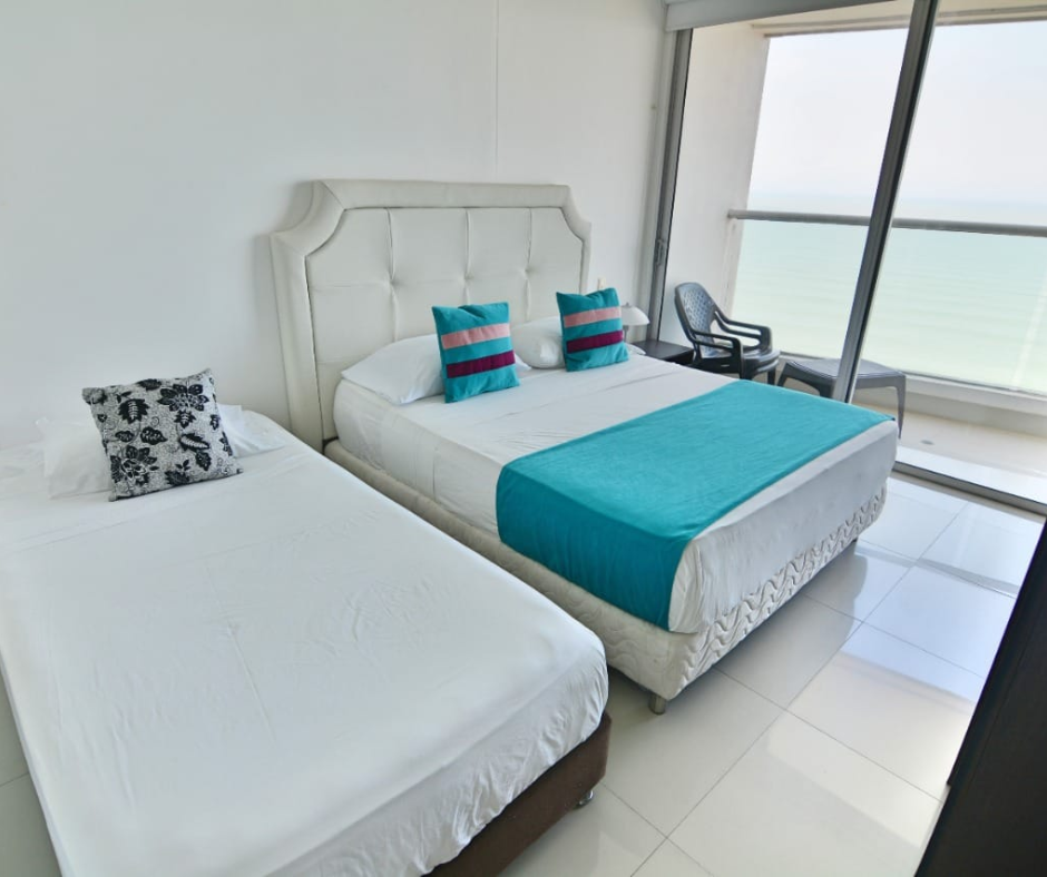 Vista general de la alcoba principal Palmetto Eliptic 1 Habitación: Confort y Diseño en Bocagrande