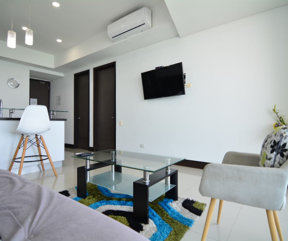 Sala comedor amplia con salida al balcón Palmetto Eliptic 1 Habitación: Confort y Diseño en Bocagrande