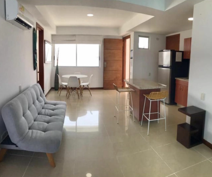 Sla con salida al balcón del penthouse del piso 37 en el Edificio Palmetto Cartagena