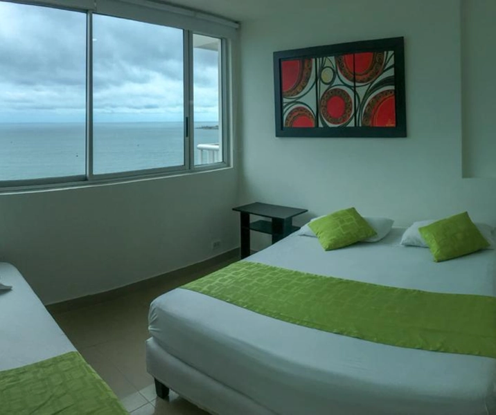 Alcoba Principal con cama doble mas cama sencilla del apartamento 1502 del Edificio Palmetto CArtagena el mejor alojamiento en Bocagrande